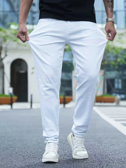 👖✨ Men’s Slim Fit White Stretch Denim Pants – All Season Comfort